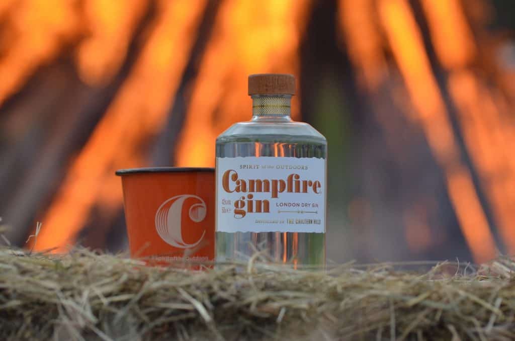 Campfire Gin in front of a huge campfire at Campfire 2017