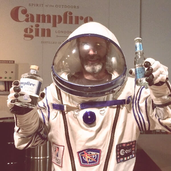Ben serving Campfire Gin wearing a space suit!